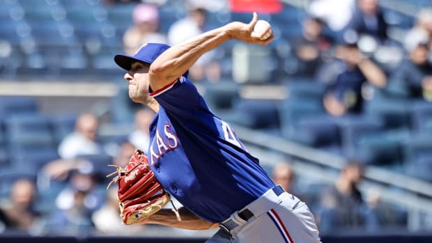 May 9, 2022; Bronx, New York, USA; Texas Rangers pitcher Brock Burke deals during the fifth inning of a baseball game against the New York Yankees at Yankee Stadium.